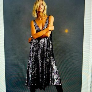 Sunday in Brooklyn by Anthropologie silver sequin dress.